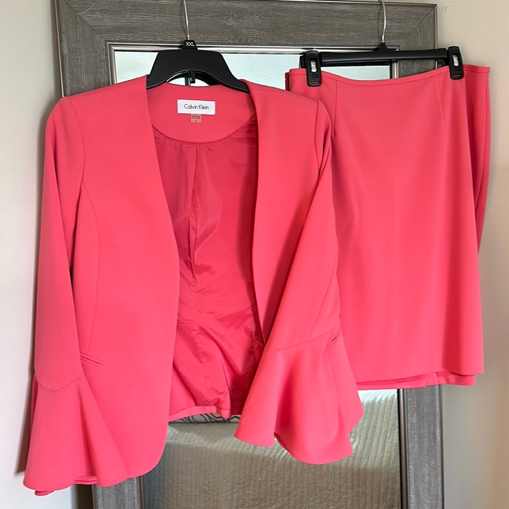 Pink Calvin Klein suit